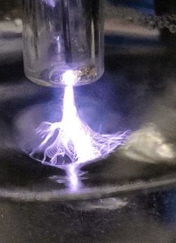 Non-thermal plasma discharges over liquids. These discharges activate the liquid through chemical reactions initiated by reactive oxygen species that cause the formation of antimicrobial compounds such as hydrogen peroxide.